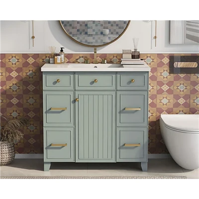 Mueble de baño pintado de verde claro con lavabo de resina